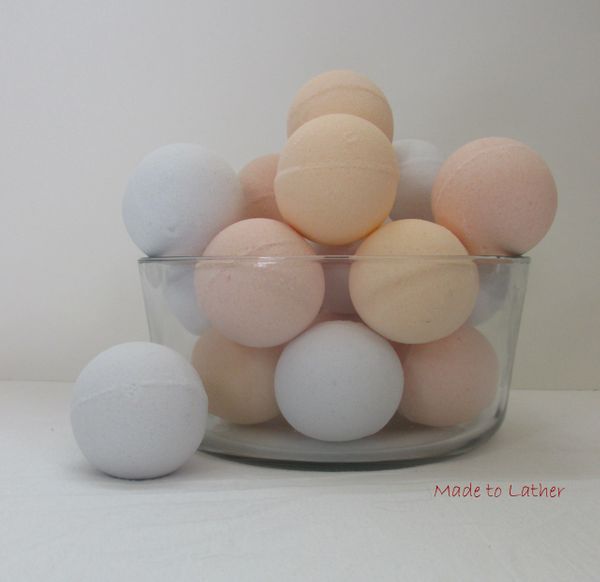 bowl of made to lather bath bombs