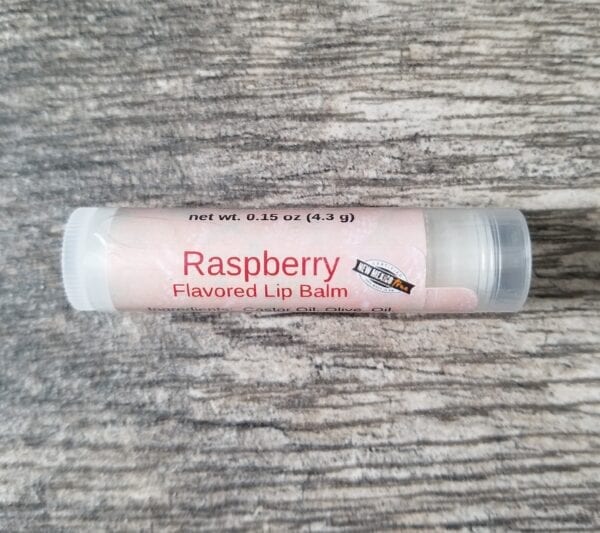 tube of raspberry lip balm by made to lather